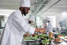 Chef preparing food in a kitchen